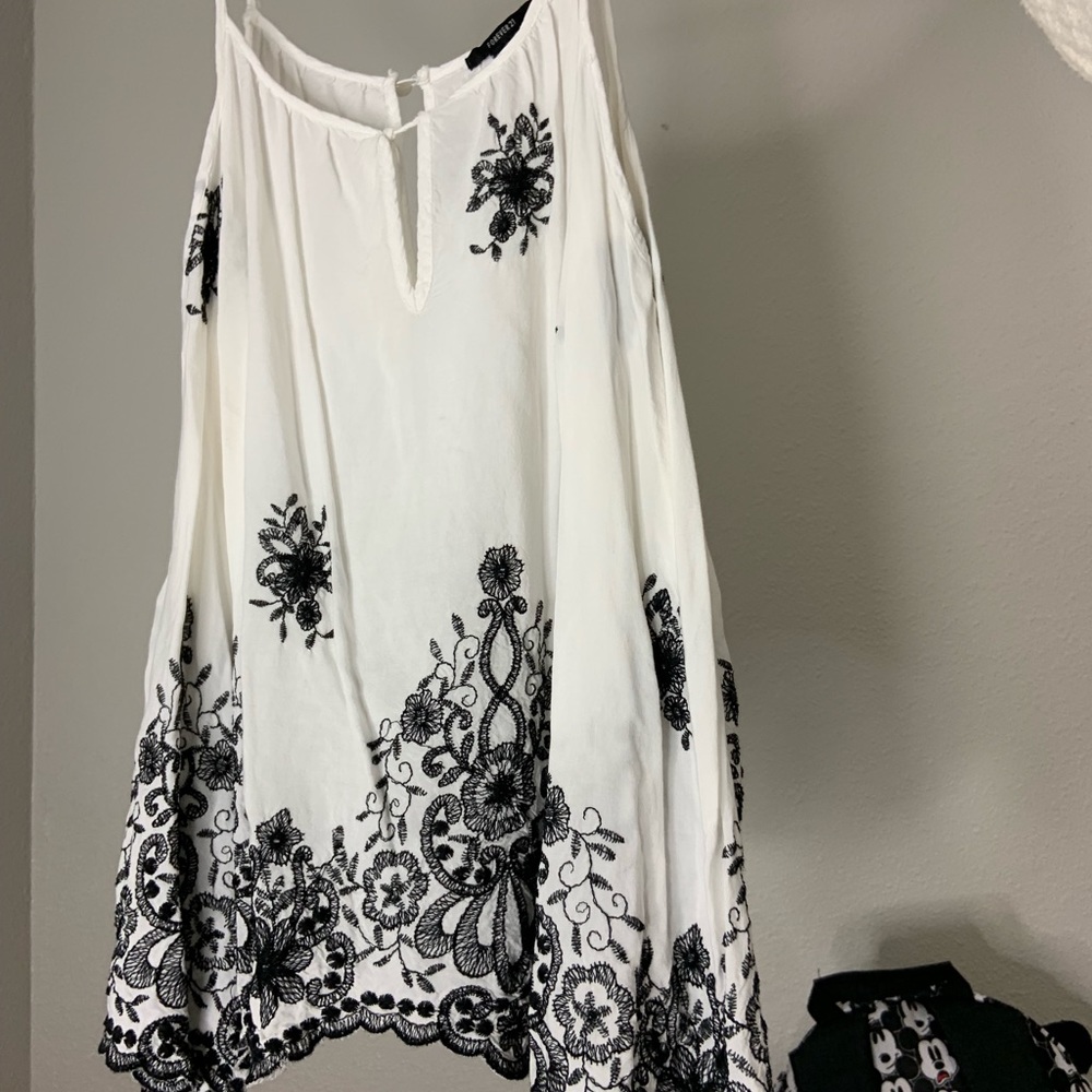 Spaghetti strap exposed shoulder top